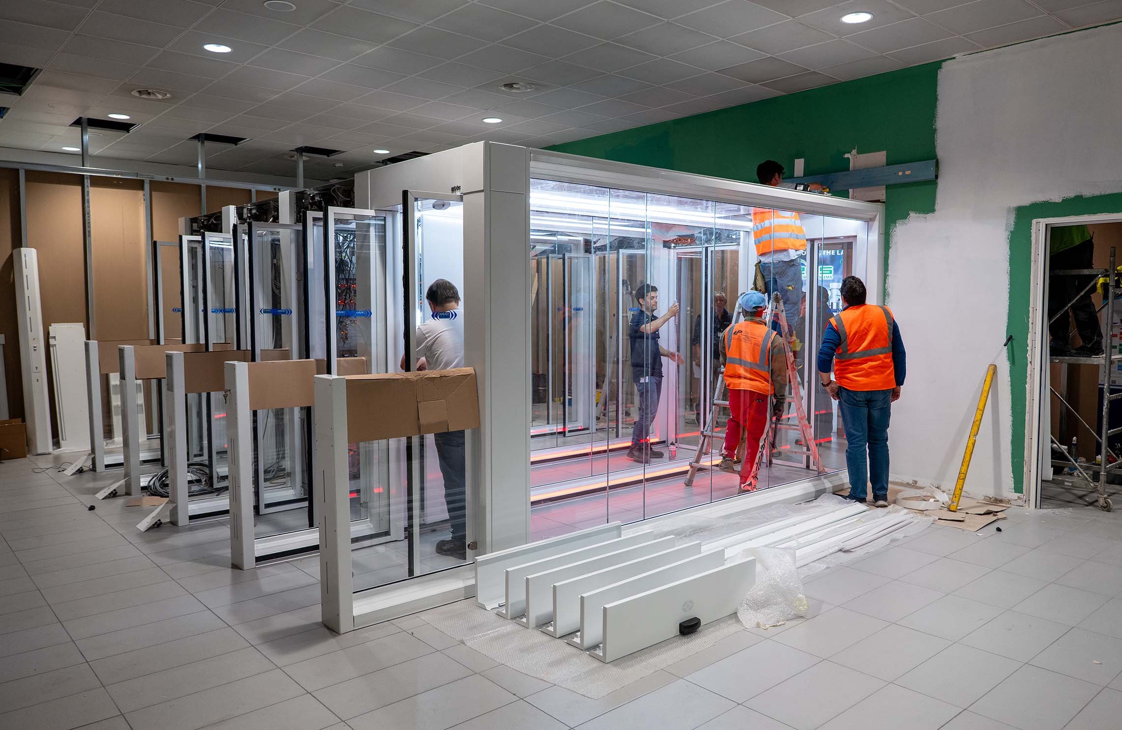 Installation of the FAAC One-Way Corridors in the Schengen Arrivals hall at Bologna Airport during construction activities